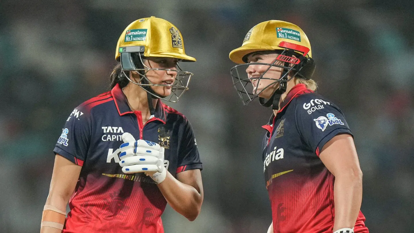 WPL 2026: RCB को मिला फाइनल का टिकट, प्लेऑफ की रेस में UP वॉरियर्स को बड़ा झटका WPL 2026: RCB को मिला फाइनल का टिकट, प्लेऑफ की रेस में UP वॉरियर्स को बड़ा झटका