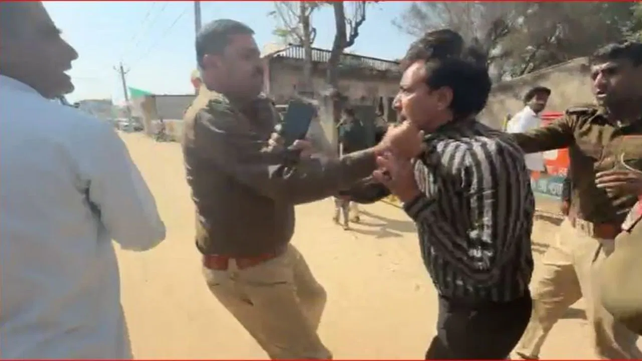 कॉलर से खींचा, जमीन पर पटका… खाटूश्याम मंदिर में फाल्गुनी मेले की तैयारियों के बीच बवाल, SHO ने युवक को पीटा, Video कॉलर से खींचा, जमीन पर पटका... खाटूश्याम मंदिर में फाल्गुनी मेले की तैयारियों के बीच बवाल, SHO ने युवक को पीटा, Video
