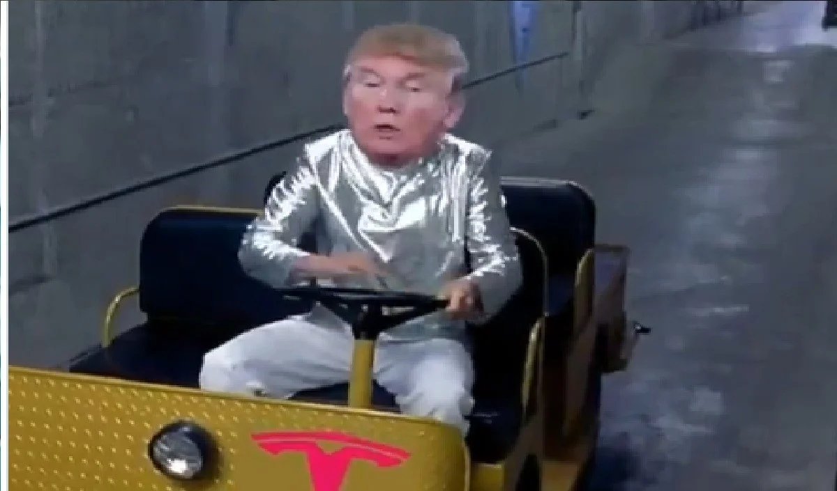 Tesla जैसी गाड़ी में फंसे Donald Trump, Iran ने AI Video में लाचारी का उड़ाया मजाक Tesla जैसी गाड़ी में फंसे Donald Trump, Iran ने AI Video में लाचारी का उड़ाया मजाक